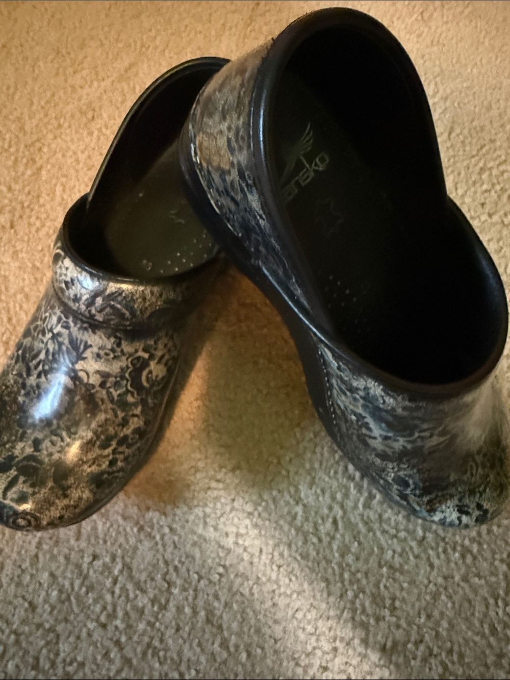 Dansko Black and Cream Floral-Pattern Clogs